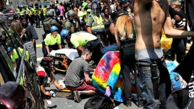 Photo of Charlottesville Mayor Signer Complicit in Murder Case