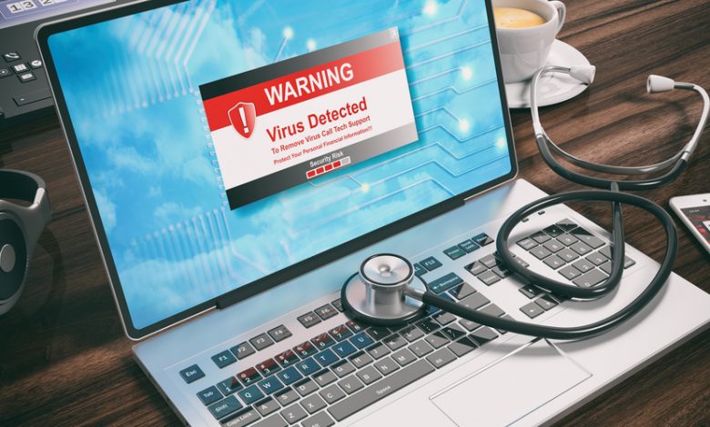 Image showing laptop with virus alert popup
