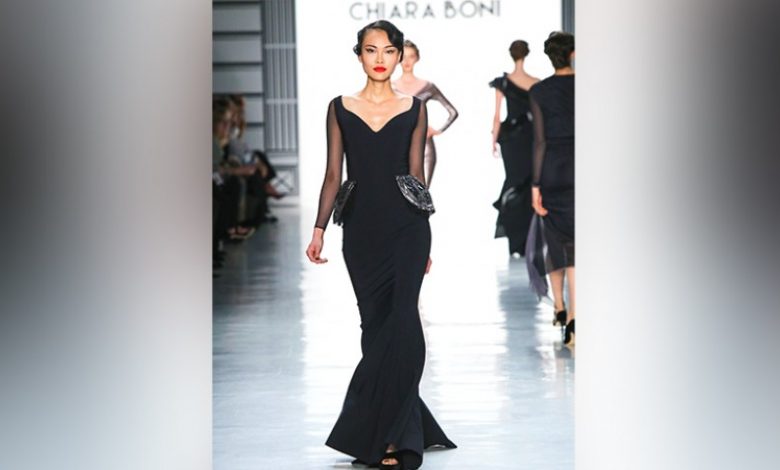 Woman in Black Dress on Fashion Runway