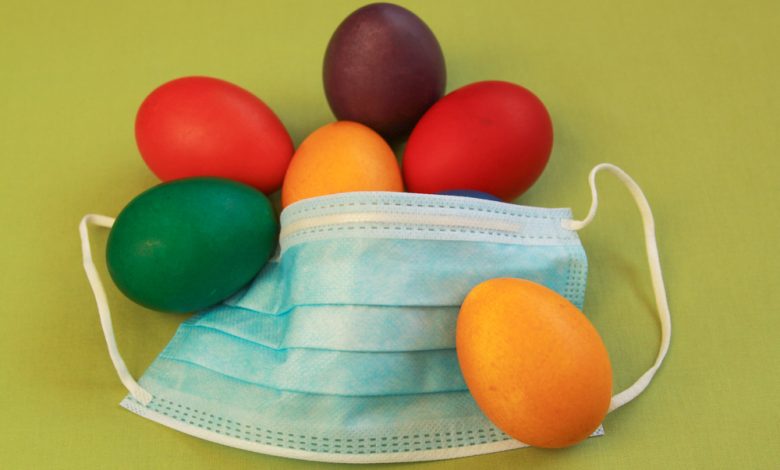 Colored eggs and a COVID-19 mask