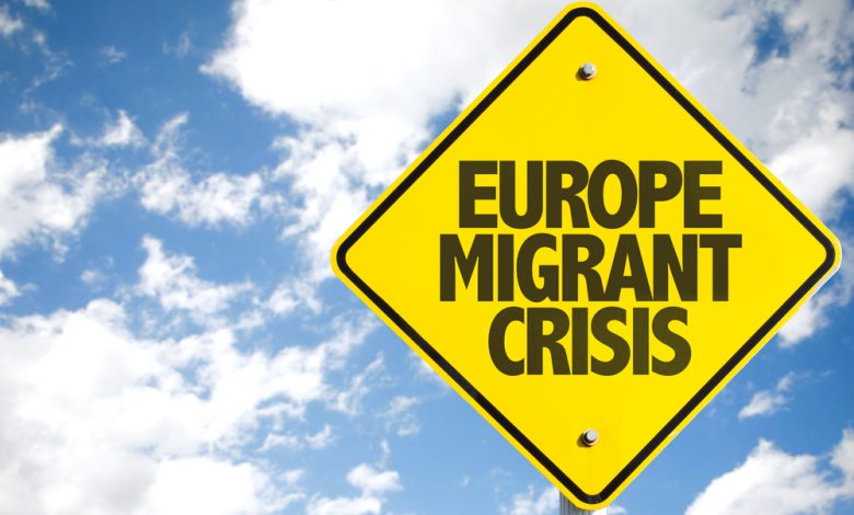 sign saying "europe migrant crisis"