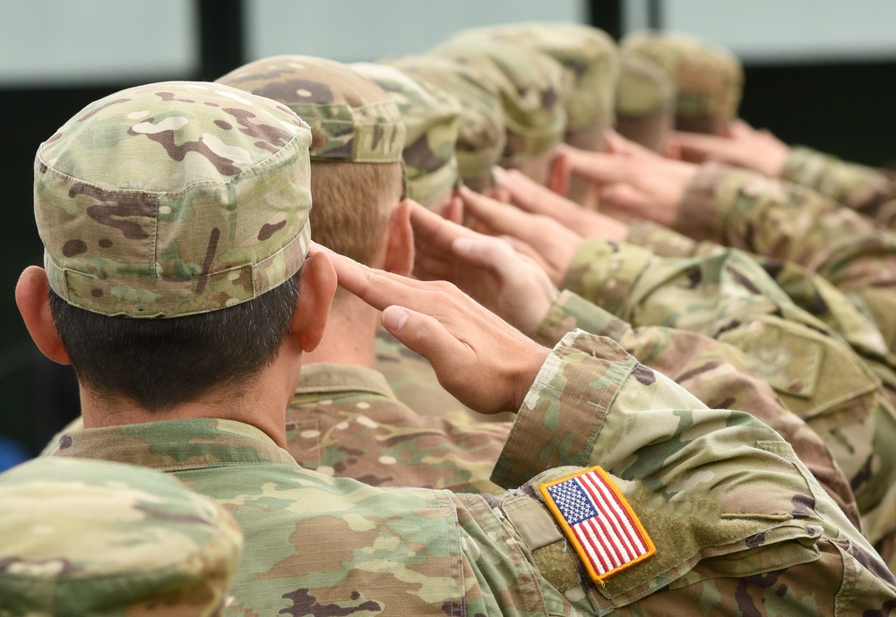 Soldiers saluting.