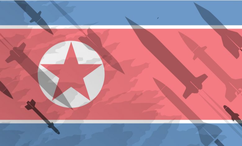 North Korean flag with missile shadow overlay.