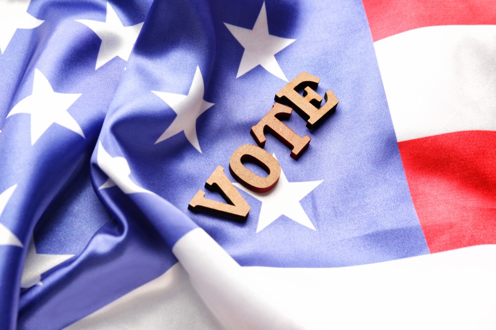 The Word Vote over the US Flag.