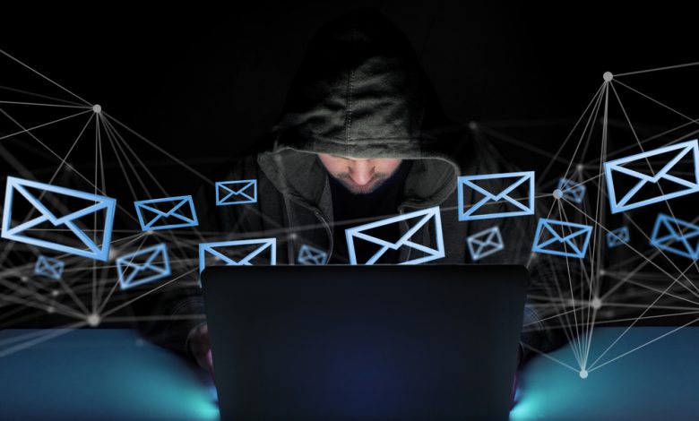 Image of hacker stealing email.