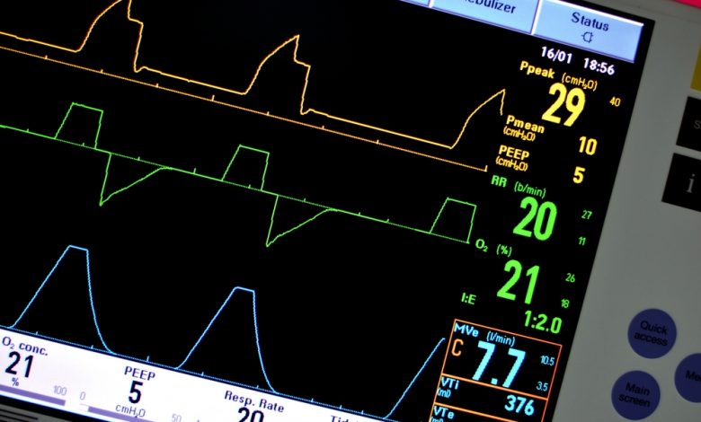Image showing a medical ventilator's monitor and vitals.