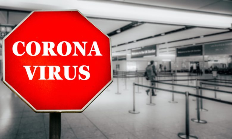 Image showing coronavirus stop sign at airport.