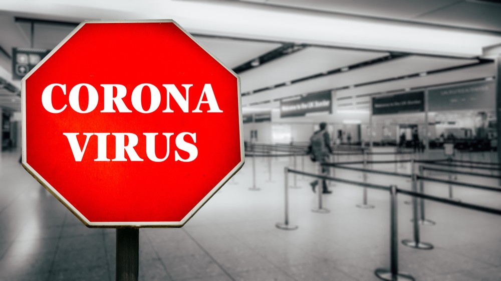 Image showing coronavirus stop sign at airport.