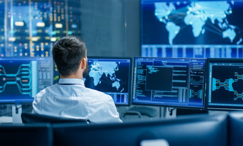 Cybersecurity professionals monitoring cyber threats.