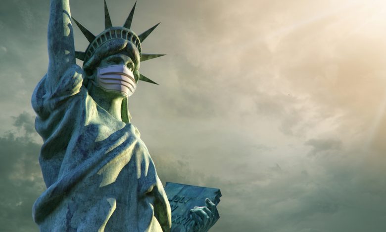 Statue of Liberty with a medical mask.