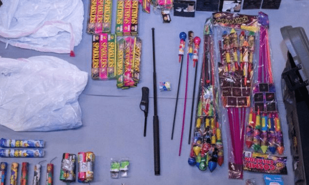 Images of fireworks and weapons retrieved from van by Seattle PD.