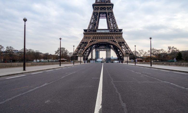 Empty Iena bridge in front of Eiffel Tower during Covid-19 Lockdown in Paris.