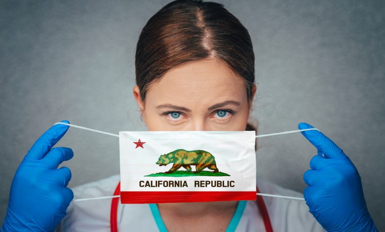 Surgical medical mask with a California flag imprinted on it.