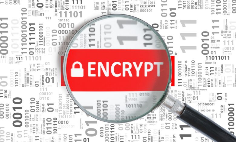 Computer security and encryption concept. Encrypt word inside magnifying glass in binary code.