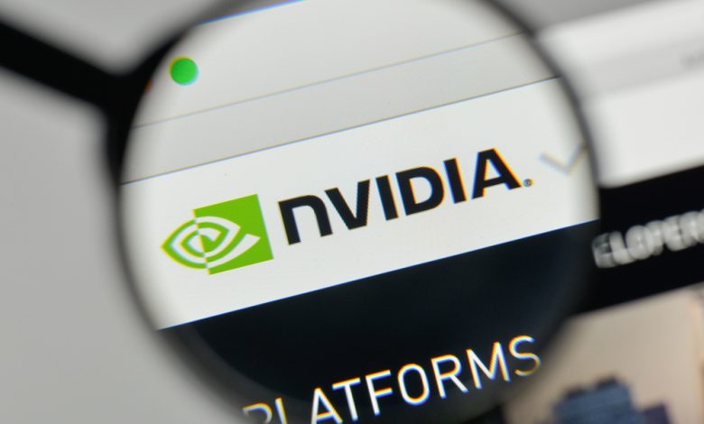 Nvidia company logo under magnifying glass.