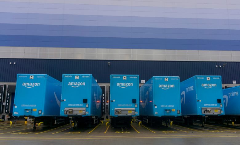 Amazon transport truck trailers outside.