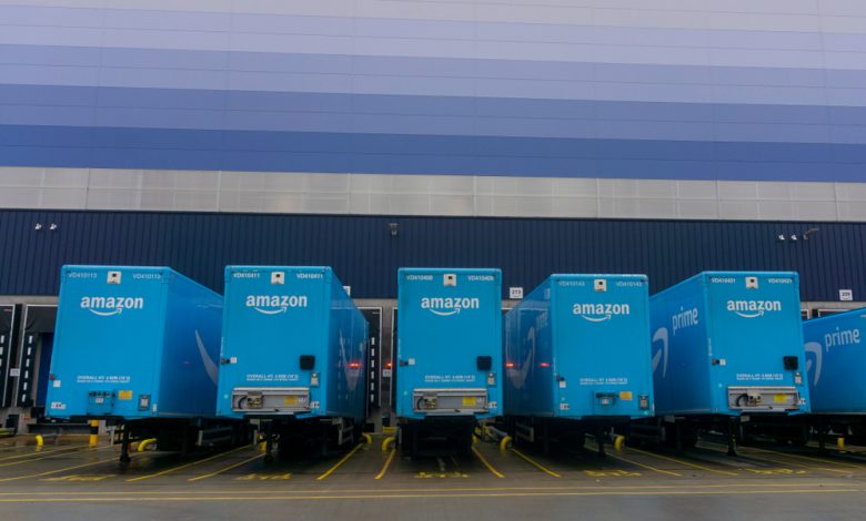 Amazon transport truck trailers outside.