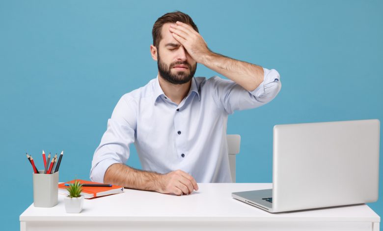 lawyer facepalming during video conference.