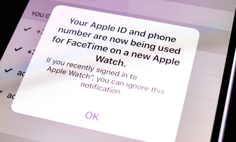 Popup on iPhone displaying a message saying “Your ‌Apple ID‌ and phone number are now being used for iMessage/‌FaceTime‌ on a new device.”