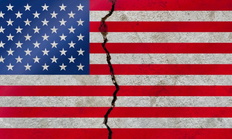 United States national flag pattern isolated on weathered broken cracked wall.