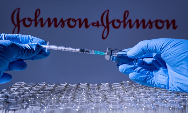 A health worker prepares to administer a shot of Johnson and Johnson’s vaccine.