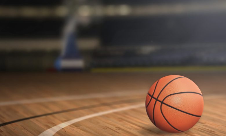 Basketball on an empty court.