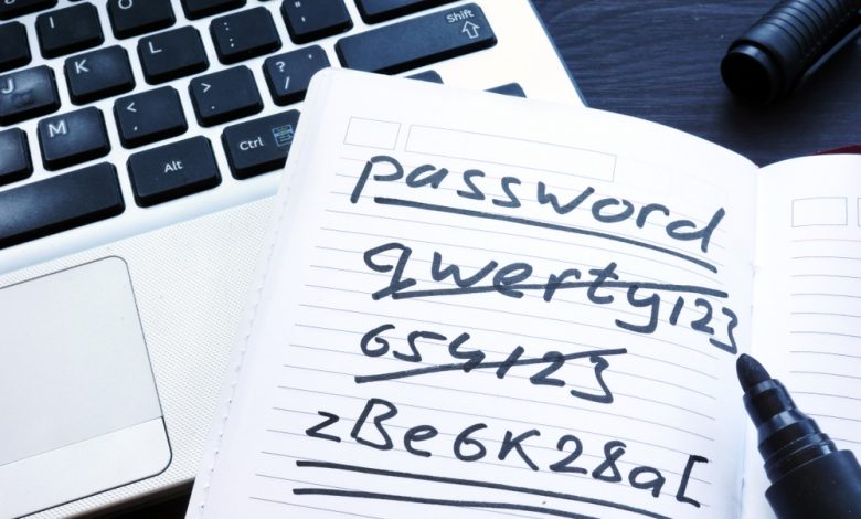 Strong and weak easy Password. Note pad and laptop.