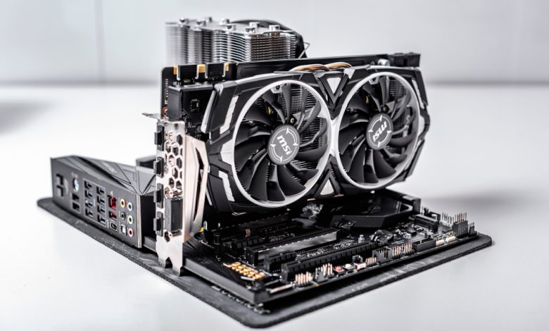 UZHGOROD, UKRAINE - October 25, 2018: Computer installation. New processor Ryzen 7 2700X and computer motherboard Asus rog crosshair vii hero, dd4 and Nvidia GTX1080.