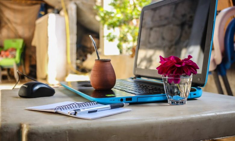 laptop with tropical drink.