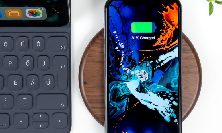 smartphone on wireless charging case at 83 percent charge