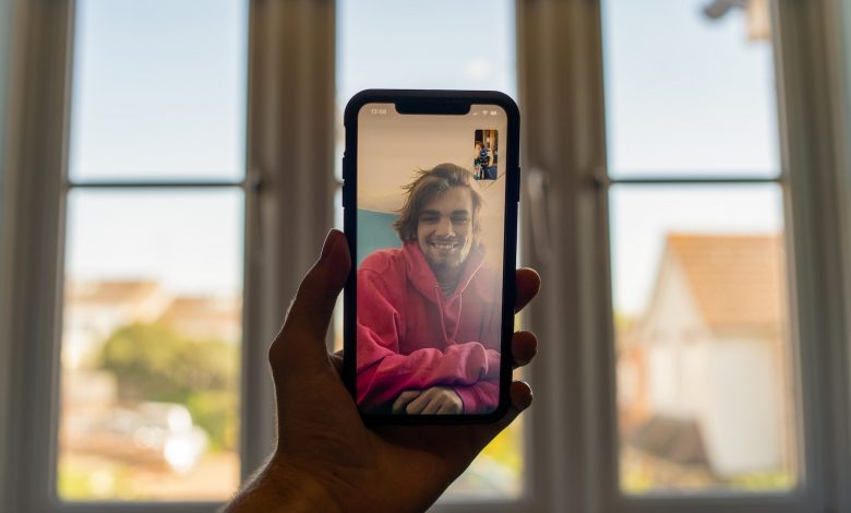person holding black iphone 5