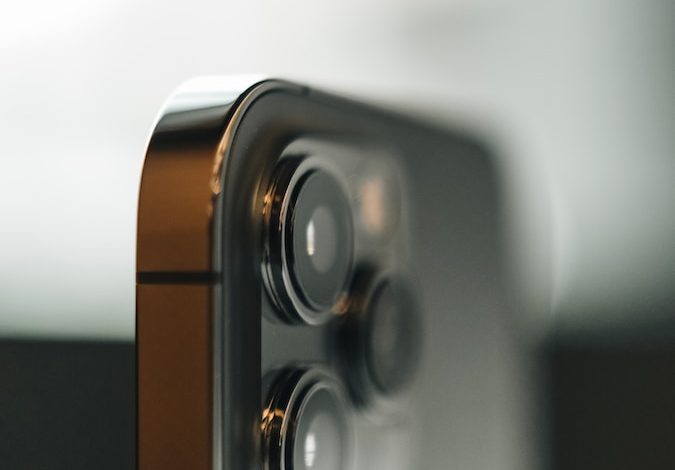 brown and silver speaker on white table