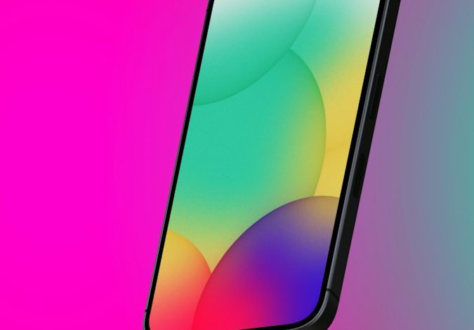 a cell phone with a colorful background
