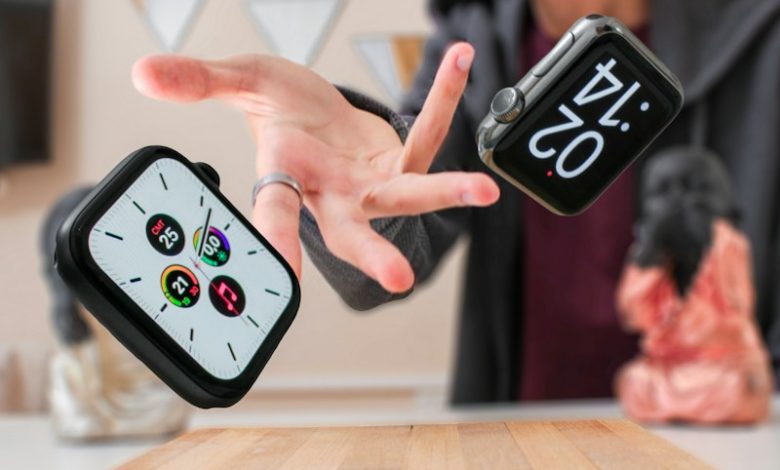 person holding black and white smartphone