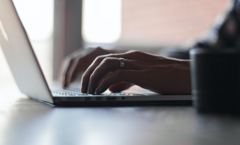 person using laptop