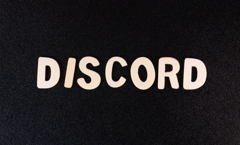 a close up of a word that reads discord