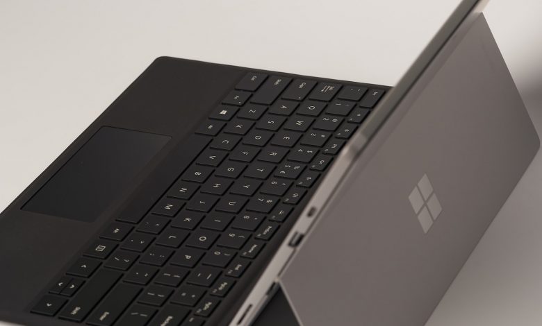 black and silver laptop computer