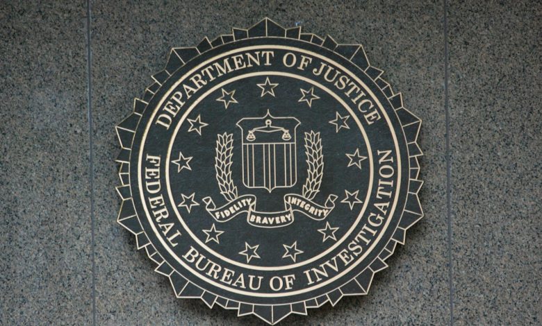 the seal of the department of justice on a wall